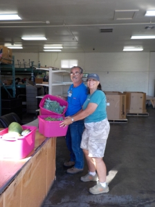 Robin Fox, representing PV Community Garden is making a Saturday morning drop off at the Yavapai Food Bank.